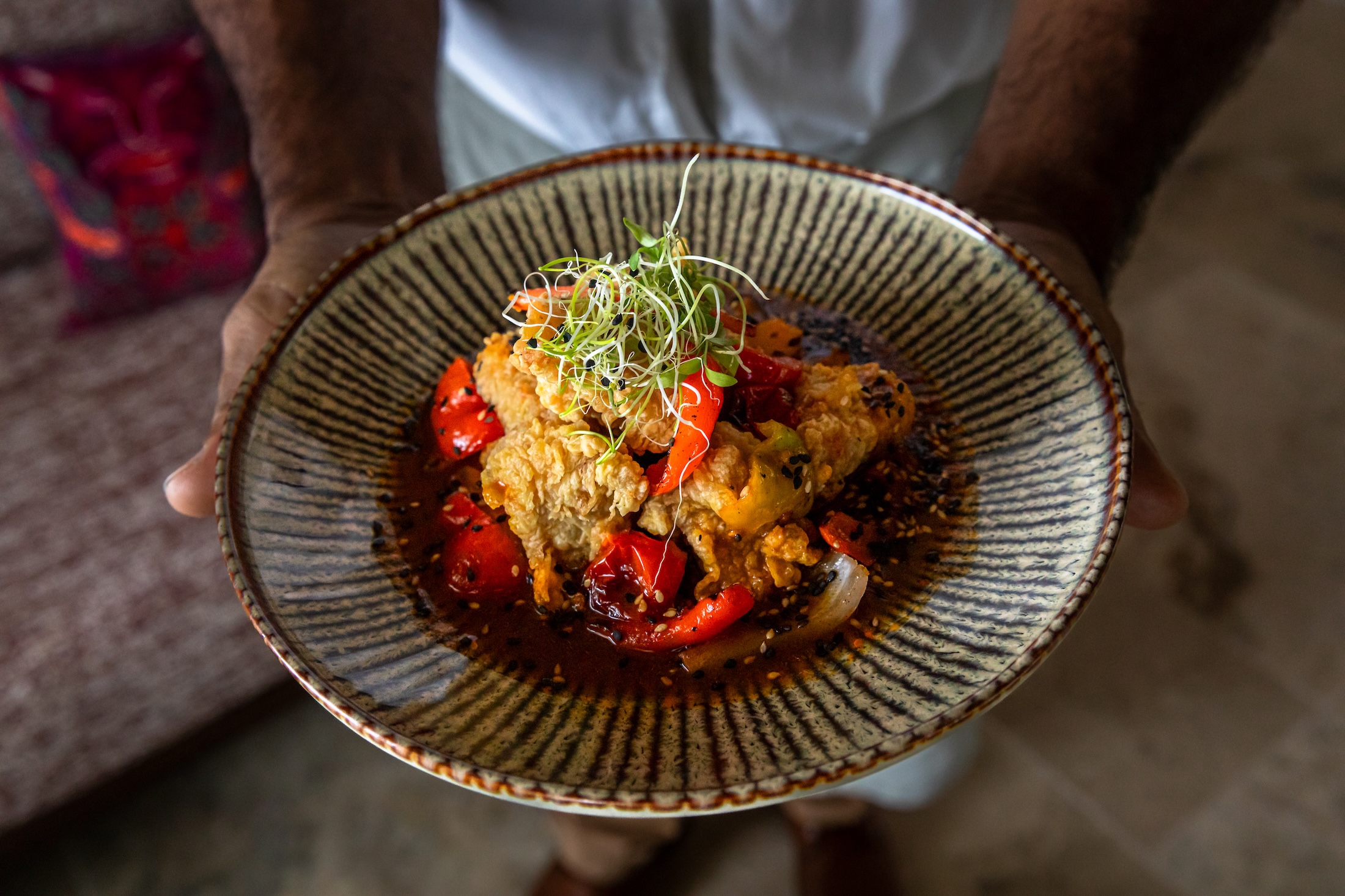 Fish stew with corn beer and aji amarillo